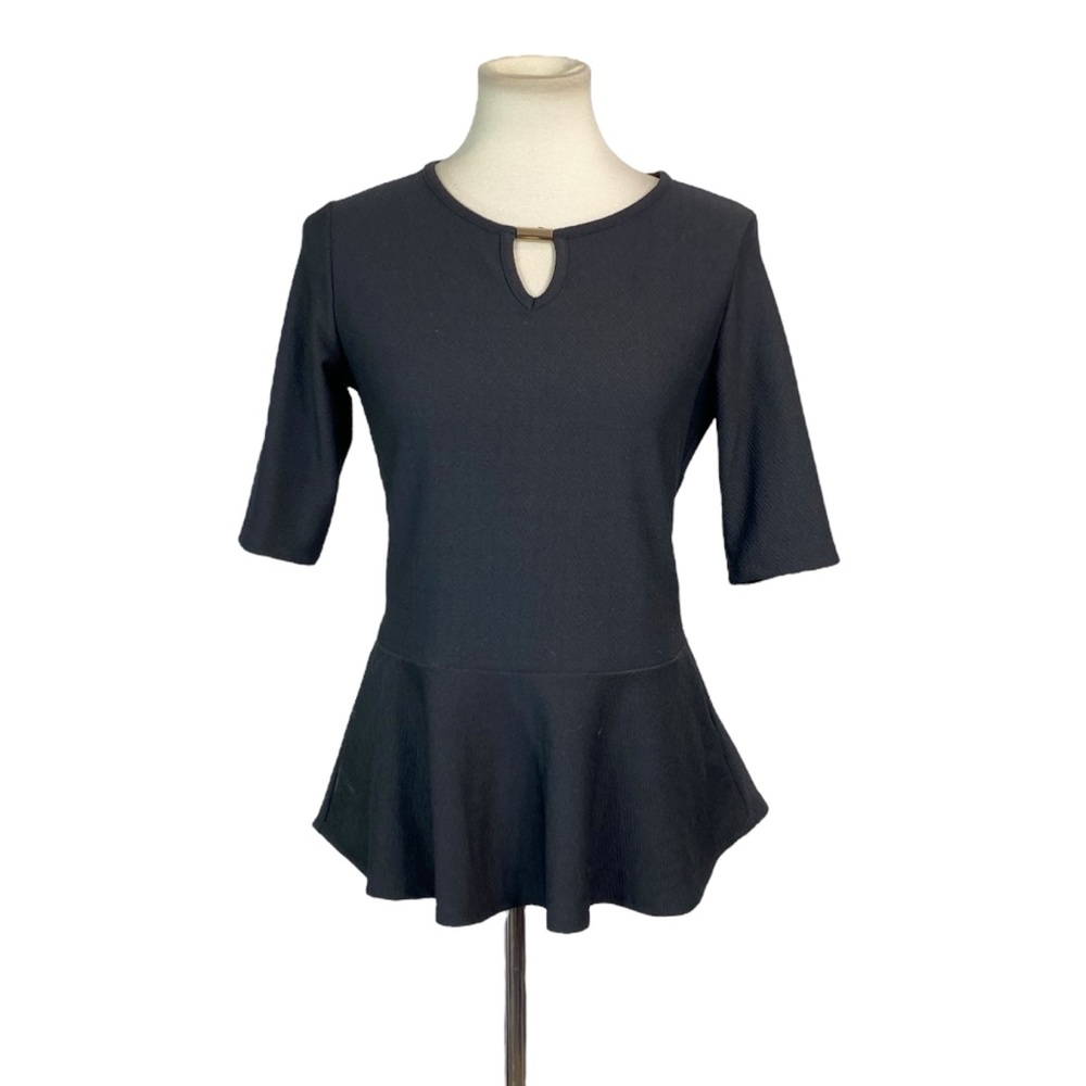 Woman’s Melissa Paige black peplum top size S